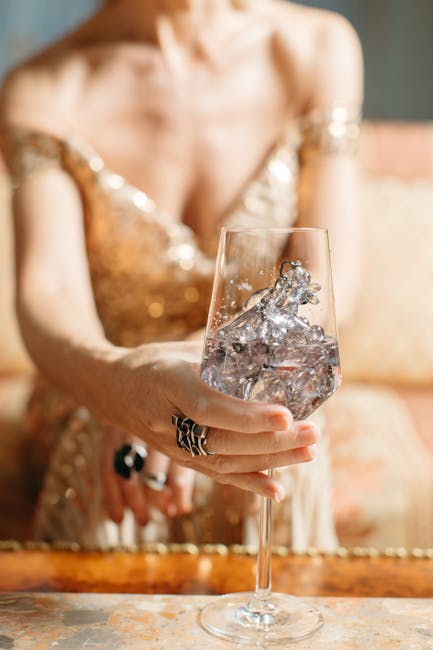 A person writing in a structured journal with a calendar and planner